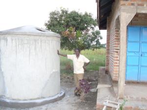 31 Mr James stood by the water harvester before it was completed