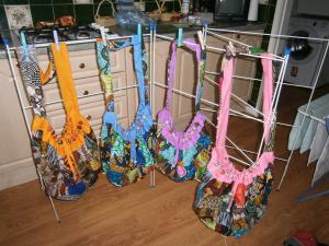 Bigger patchwork shoulder bags with beautiful beaded trim, fully lined with inside pocket and tie and Velcro fastening. Suggested donation to St James in Uganda £9.00